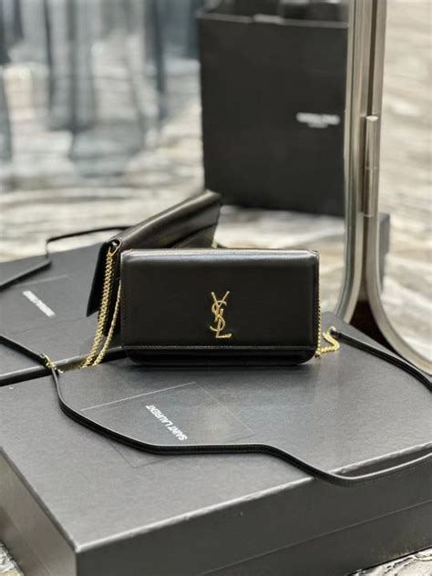 ysl phone case card holder|YSL cassandre phone holder.